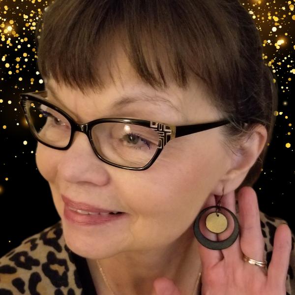 Dawn sporting Circle Dance in black and gold