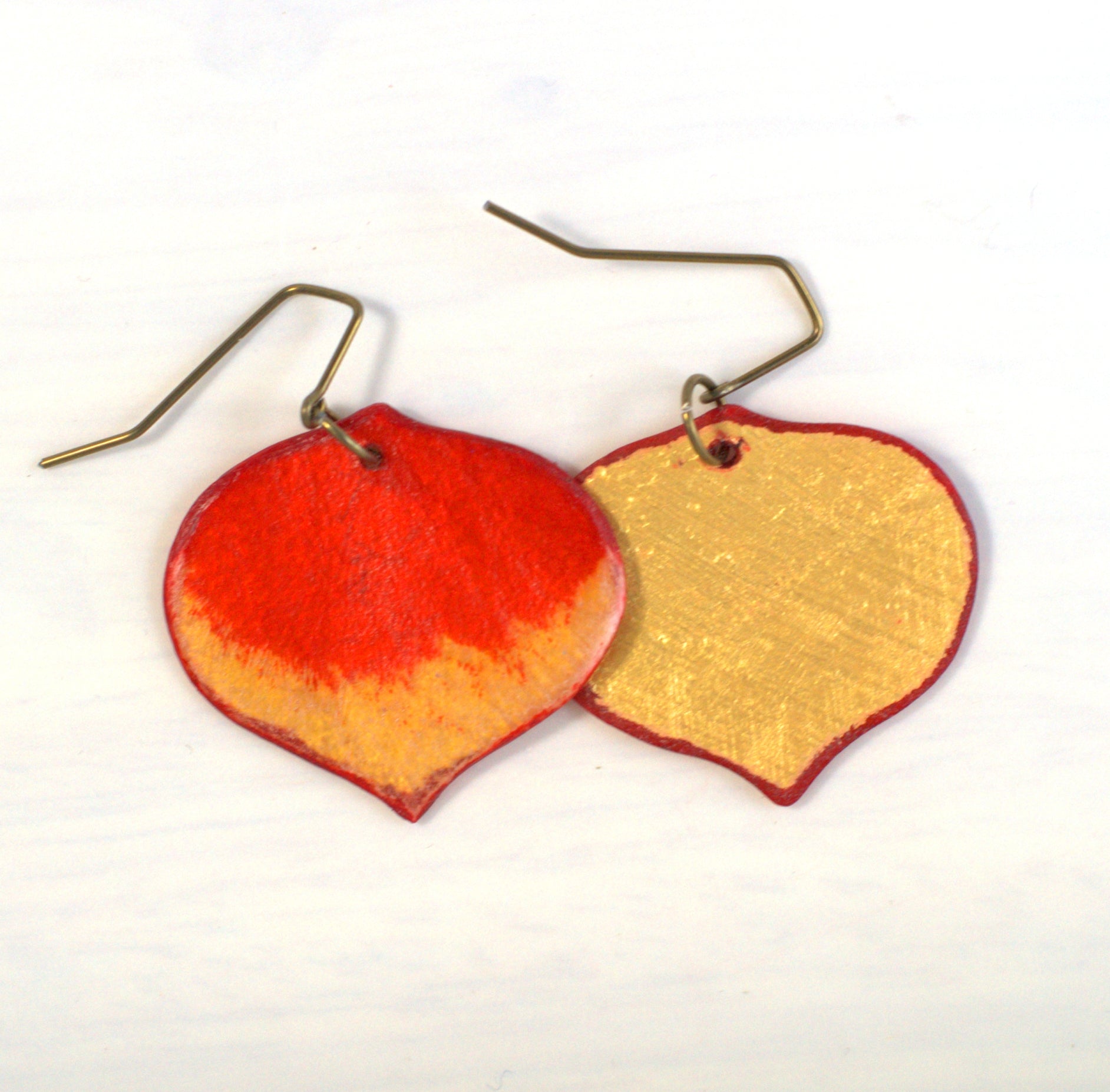 Front and back view of the medium sized red Aspen leaf earrings
