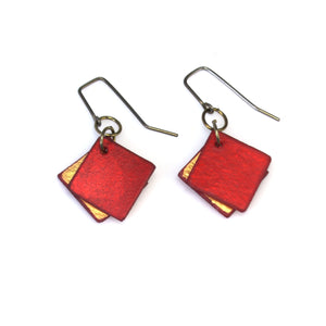 Open image in slideshow, lightweight hypoallergenic diamond geometric metallic painted rawhide dangle earrings, handmade in Wyoming, ruby red and gold
