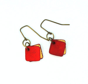 Open image in slideshow, lightweight hypoallergenic diamond geometric metallic painted rawhide dangle earrings, handmade in Wyoming, ruby red and gold
