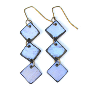 Open image in slideshow, lightweight hypoallergenic diamond geometric metallic painted rawhide dangle earrings, handmade in Wyoming, blue
