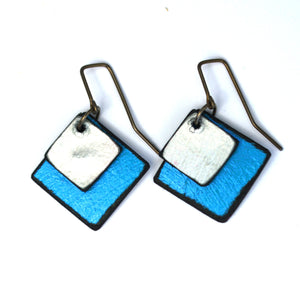 Open image in slideshow, lightweight hypoallergenic diamond geometric metallic painted rawhide dangle earrings, handmade in Wyoming, turquoise blue and silver
