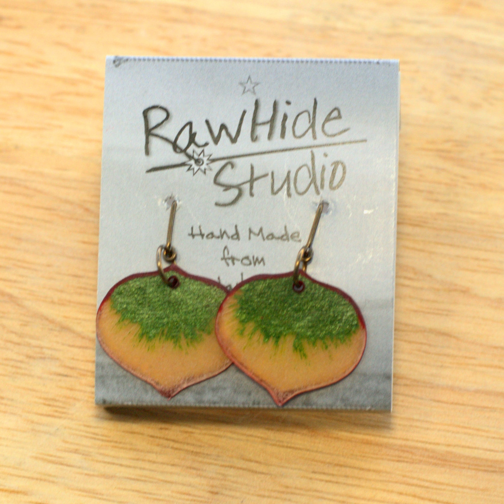 Small green Aspen leaf earrings on display card