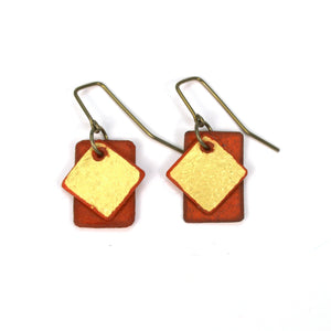 Open image in slideshow, lightweight hypoallergenic diamond rectangle geometric metallic painted rawhide dangle earrings, handmade in Wyoming, ruby red and gold

