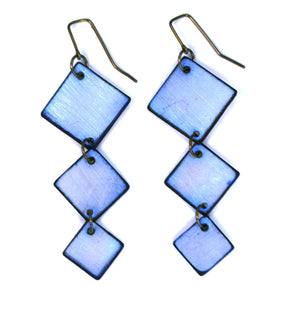 Open image in slideshow, Iridescent Blue colored Square Dance earrings are made with three diamond shapes. Made with lightweight rawhide in Wyoming USA
