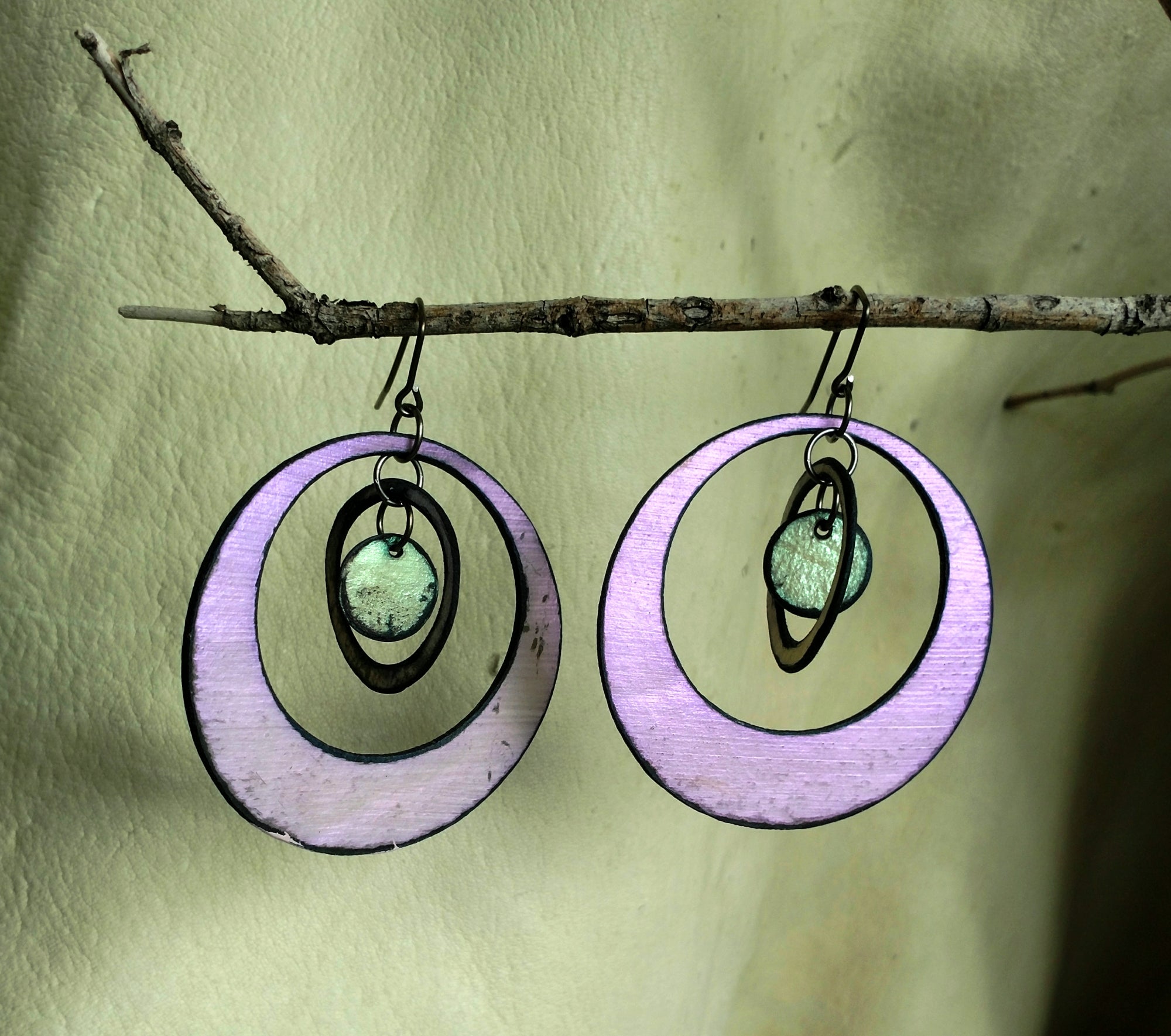 lightweight hypoallergenic rectangle geometric metallic painted rawhide dangle earrings, handmade in Wyoming, violet and green