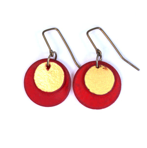 Open image in slideshow, lightweight hypoallergenic circle geometric metallic painted rawhide dangle earrings, handmade in Wyoming, ruby red and gold
